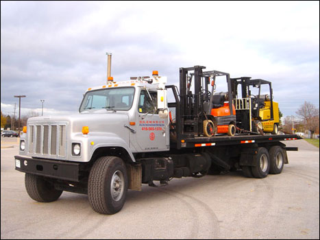 Truck Moving Heavy Machinery